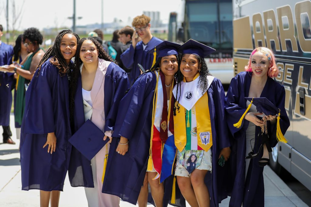 Group of graduating students smiling