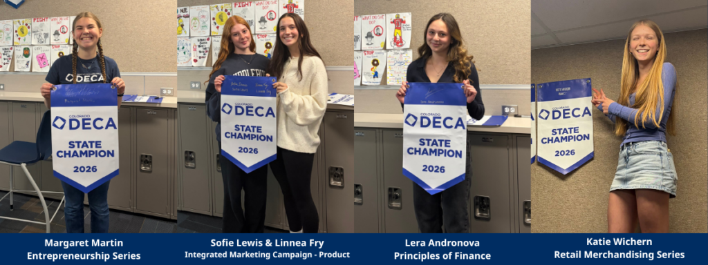 Pics of DECA state champion students holding their banner.