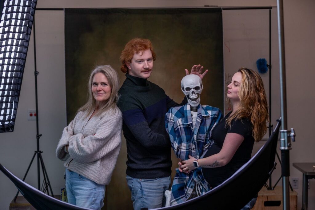 Performing Arts Teachers:  Hanan Al-Naqeeb, Mark Moen and Ms. Barkey.  There is a skeleton in a flannel to represent Mark Miller.